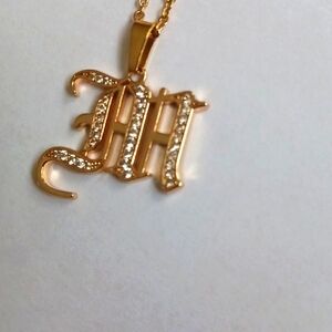 Gold Caligraphy Cubic zirconia Necklace